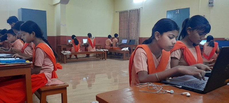 Female kids on laptop
